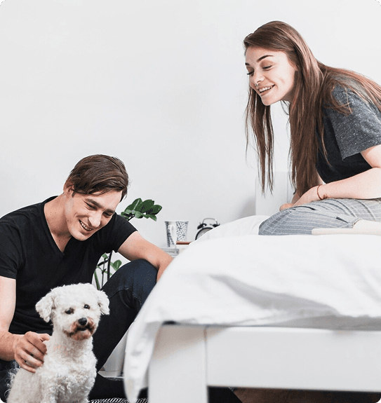 People with small white dog